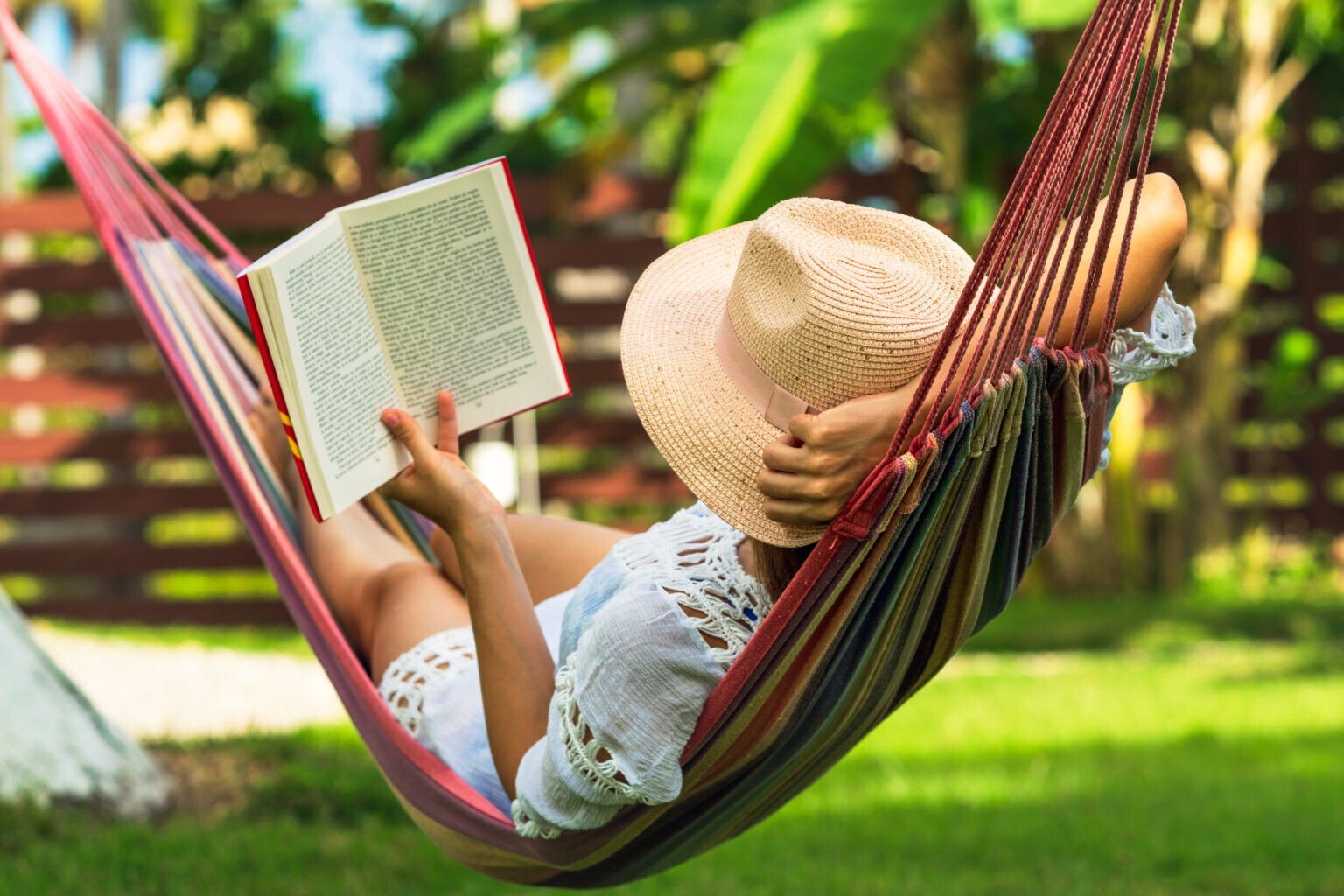 Woman reading in a hammock